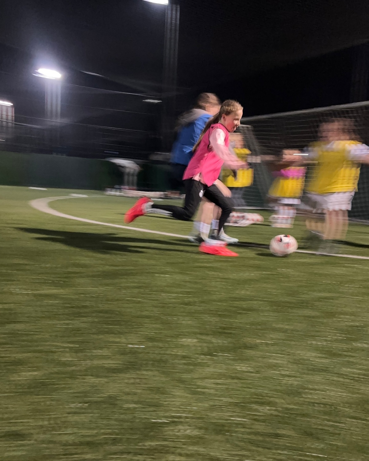 Girls football coaching session